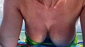 Hey, check this hot italian milf artemisia love rocking a micro bikini at miami public beach 😍 big tits fetish outside, so sexy!
