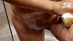hey my step sister lets me watch her shower with those big tits and wet body it's a total voyeur fantasy