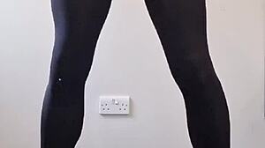 This tranny pulled out a massive cock, stroking it until cum exploded all over the pantyhose in a wild display