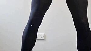 This tranny pulled out a massive cock, stroking it until cum exploded all over the pantyhose in a wild display