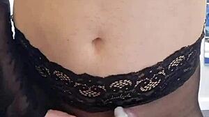 This tranny pulled out a massive cock, stroking it until cum exploded all over the pantyhose in a wild display