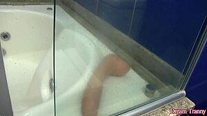 Sexy tranny Amanda Ferraz unleashes wild dildo play in steamy bathtub session