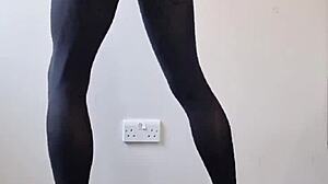 This tranny pulled out a massive cock, stroking it until cum exploded all over the pantyhose in a wild display