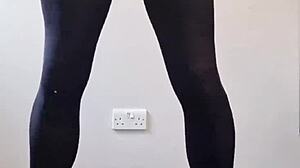 This tranny pulled out a massive cock, stroking it until cum exploded all over the pantyhose in a wild display