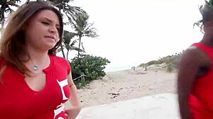 Lifeguard sucks big dick on public beach break