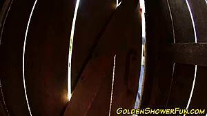 Piss-loving redhead gets cum sprayed outdoors