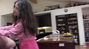 Brunette with huge breasts fucks lesbian friend using strapon