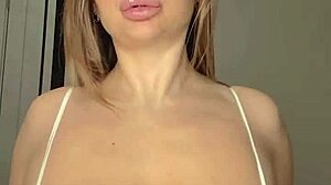 Busty mommy wife shows off her huge natural tits in a revealing display