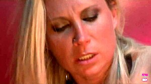 a guy takes control over chained busty blonde in intense bathroom scene