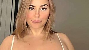 Busty mommy wife shows off her huge natural tits in a revealing display