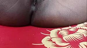 Fingering my ebony pussy fast until squirting cum covers my fingers