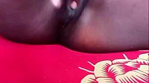 Fingering my ebony pussy fast until squirting cum covers my fingers