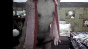 sexy filipina strips teasing small tits in ripped clothes dance