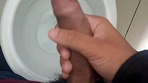 brazilian teen strokes monster cock in bathroom solo