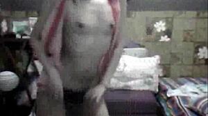 sexy filipina strips teasing small tits in ripped clothes dance