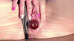 Lilyanaly stuffs fruits deep into pussy on beach