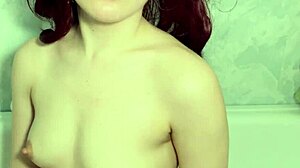 i love sucking this dildo with my small tits out in bath