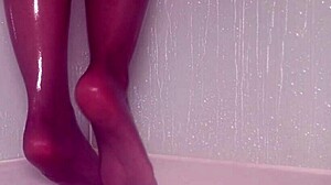 Wet nylon feet tease seductively in steamy shower play