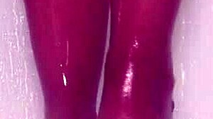 Wet nylon feet tease seductively in steamy shower play