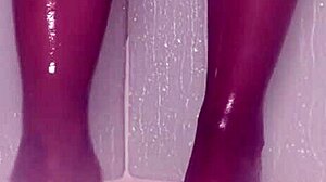 Wet nylon feet tease seductively in steamy shower play