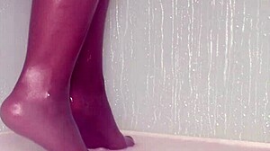 Wet nylon feet tease seductively in steamy shower play