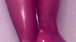 Wet nylon feet tease seductively in steamy shower play