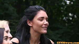 Classy British femdom chokes and tugs tattooed sub outdoors