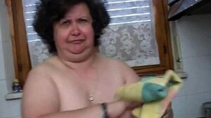 chubby old italian lady masturbates hard with her broomstick