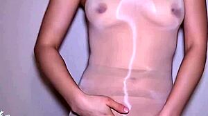 Petite asian in see through dress rubs pussy for huge cum load