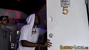 Filthy skank slurps massive black cock at gloryhole cum dump