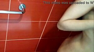 latina milf's huge natural tits shine under shower