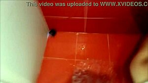 latina milf's huge natural tits shine under shower