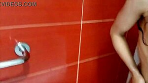 latina milf's huge natural tits shine under shower