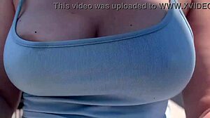 Artemisia Love struts outdoors braless with big tits bouncing