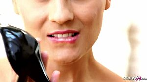 Skinny German photo model gives teasing POV footjob in fishnet body