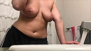 Hidden Cam Catches Curvy Big Tits Shower with Shaved Nipples