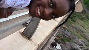 Cute ebony girlfriend sneaks deep road head on african safari pov