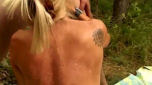 Two cocks make her moan wildly outdoors!