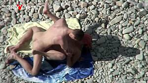 WOW! Busty cougar milf rides young stud's cock on public beach!