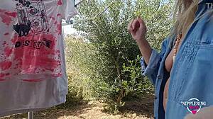 Nippleringlover kinky milf plays with pierced pussy nipples outdoors extreme