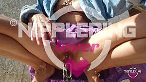 Nippleringlover kinky milf plays with pierced pussy nipples outdoors extreme