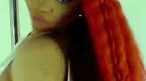 Freaky ebony zaemia shakes tits for cash strip