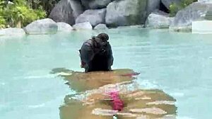 Monika Fox struts sexy pink bikini poolside flaunting fake tits tattoos outdoors