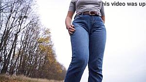 milf teases her big cameltoe through tight jeans outside