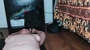 Hot milf stretches in tight yoga pants during early morning routine with big tits