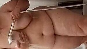 Horny amateur masturbates in shower until explosive orgasm