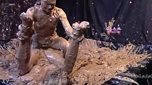 Glamorous babes slip and slide in messy mud wrestling chaos
