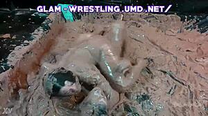 Glamorous babes slip and slide in messy mud wrestling chaos