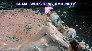 Glamorous babes slip and slide in messy mud wrestling chaos