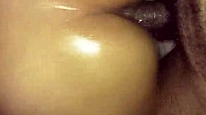 Prostitute shakes her oily buttocks hard and bold